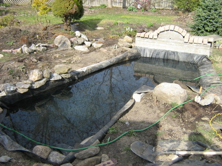Where the huge rock is on the right will have another liner spliced in and will the be stoney beach.\