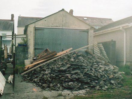 Rubble waiting to be carried in to fill in the garden.