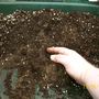 Mixing the compost