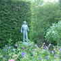 Venetian Lead Statue with Geraniums Stockton Bury