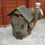 .S-in-L Gdn.  One conifer stump disguessed