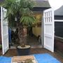 Blog 10.  Front garage - palm